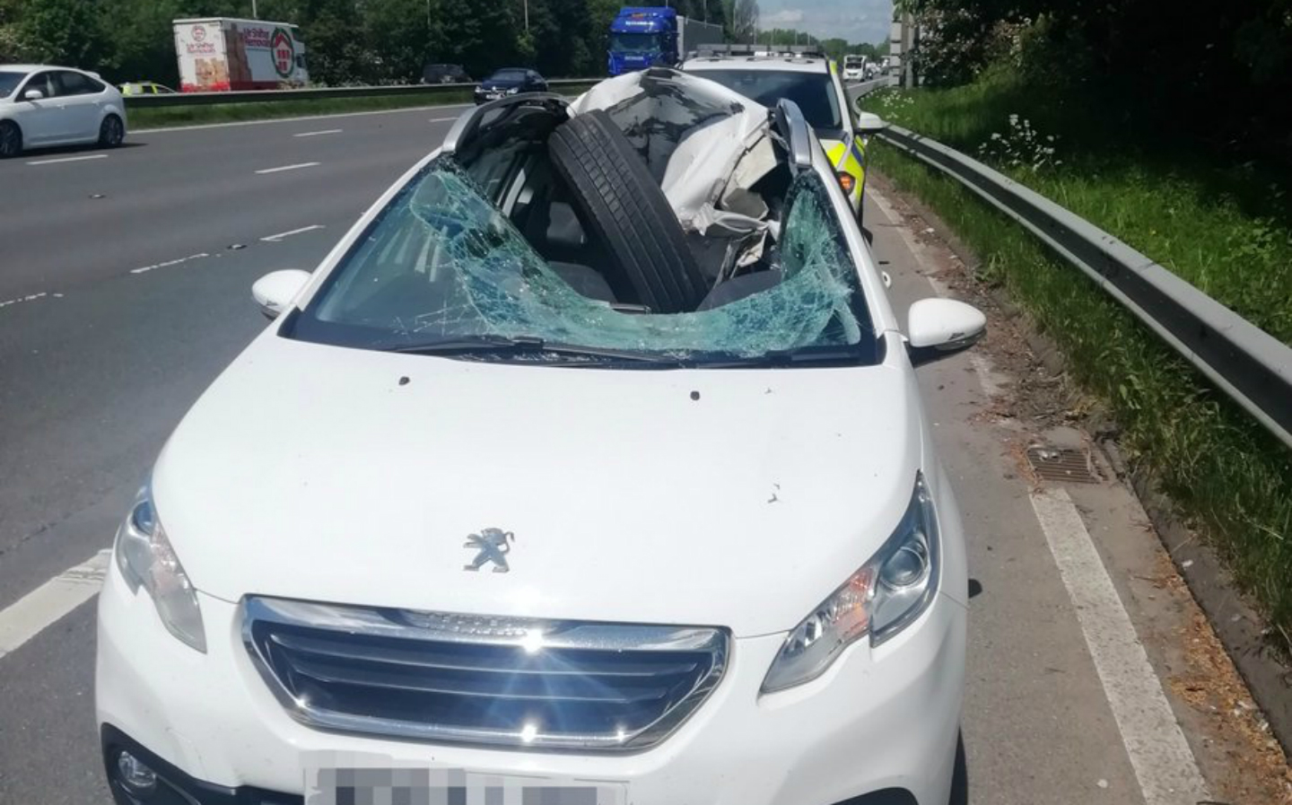 "Luckiest person in the world" survives lorry wheel smashing through windscreen