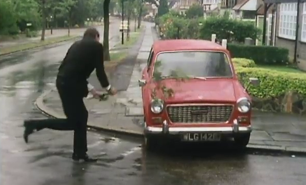 Fawlty Towers Basil attacks car