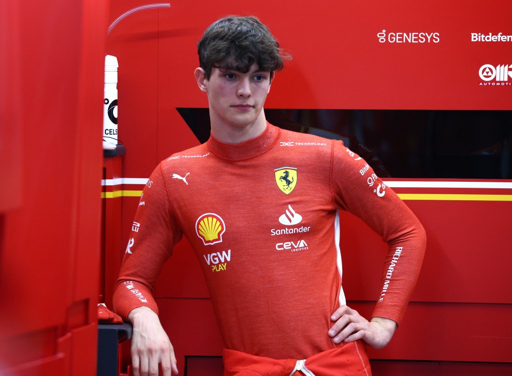 JEDDAH, SAUDI ARABIA - MARCH 09: 7th placed Oliver Bearman of Great Britain and Ferrari looks on in the pits prior to competing in the F1 Grand Prix of Saudi Arabia at Jeddah Corniche Circuit on March 09, 2024 in Jeddah, Saudi Arabia. (Photo by Clive Rose/Getty Images)